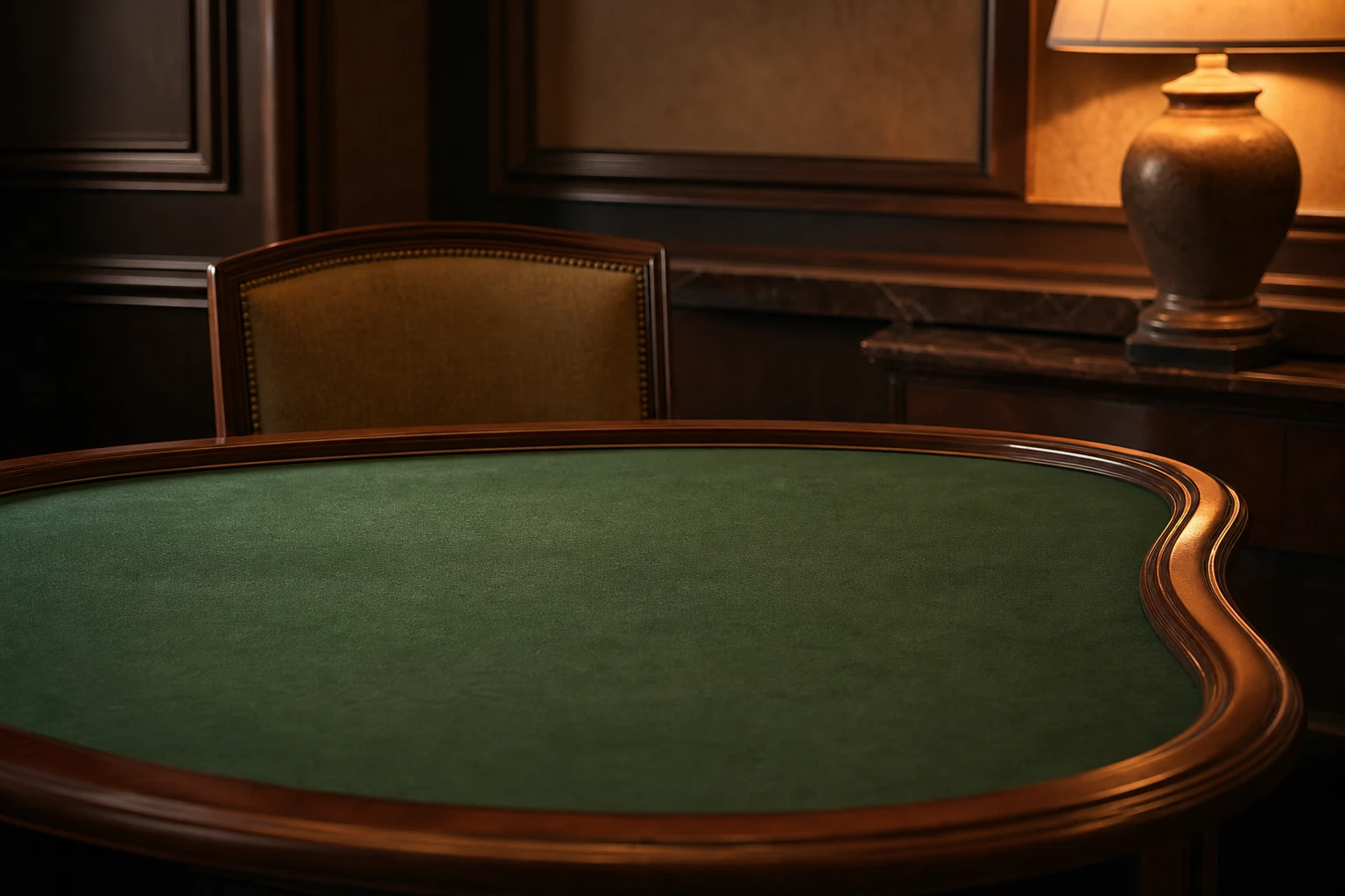 Detail of an empty baize card table under warm lamplight